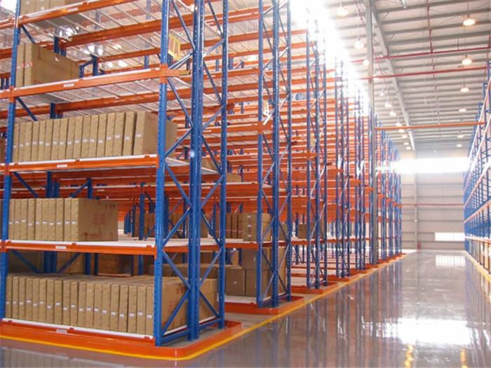 Very narrow aisle VNA racking system in warehouse with tall pallet racks